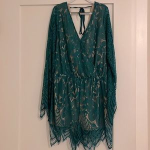 Emerald green lace romper, lined. Plunging neck line and back. Worn once.
